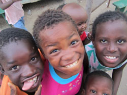 Photo of smiling children.